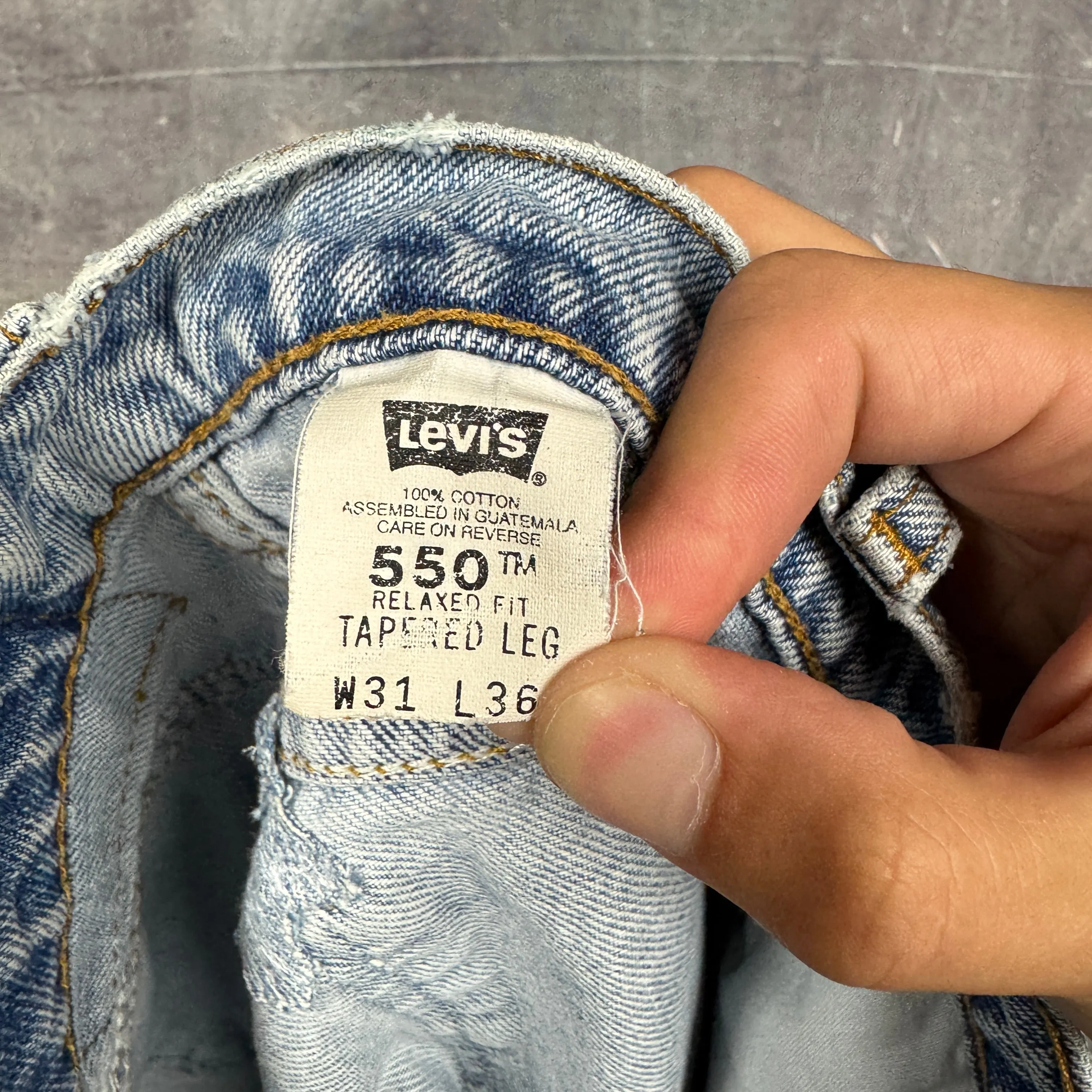 90s Light Wash Orange Tab Levi's 550 Denim Jeans 30x35 0671