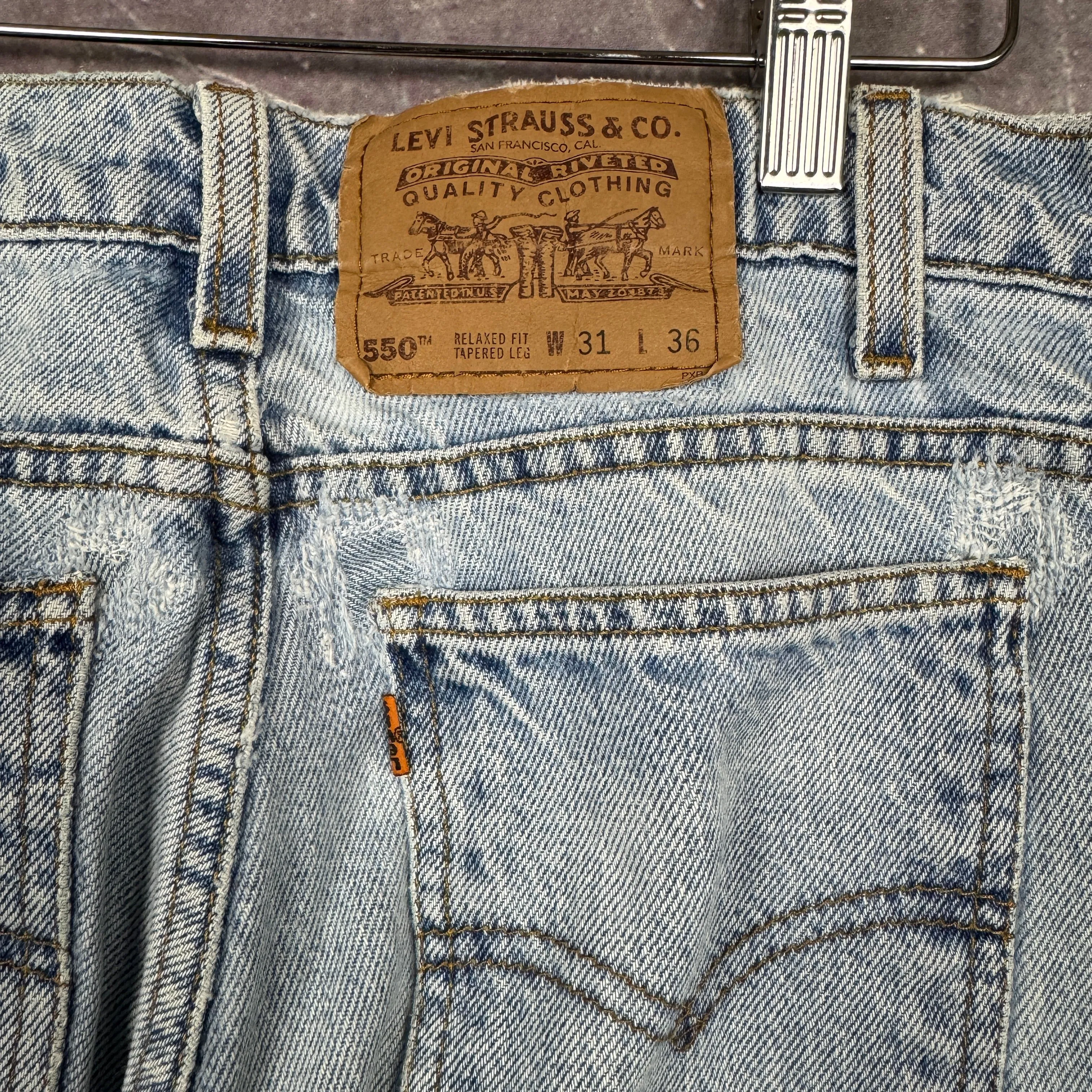 90s Light Wash Orange Tab Levi's 550 Denim Jeans 30x35 0671