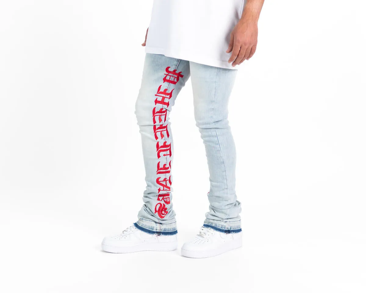 Pheelings AGAINST ALL ODDS FLARE STACK DENIM (LIGHT BLUE/RED)