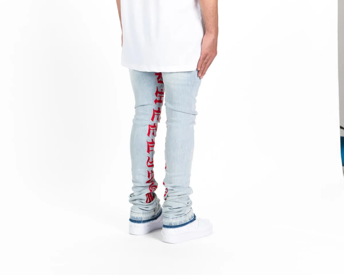 Pheelings AGAINST ALL ODDS FLARE STACK DENIM (LIGHT BLUE/RED)